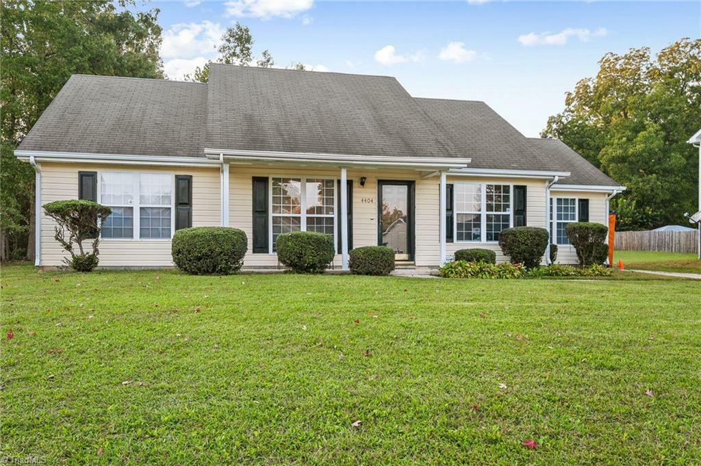 Property Photo:  4404 Pleasant Valley Road  NC 27406 