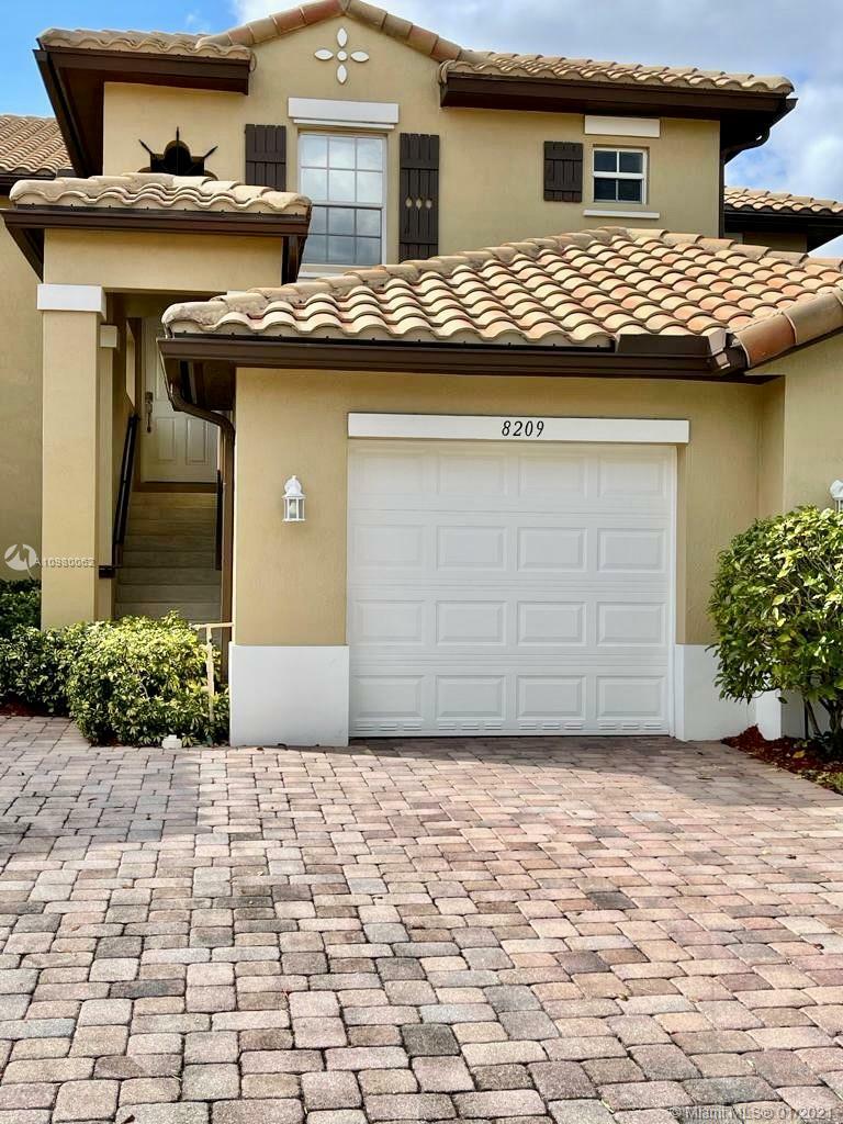 Property Photo:  8209 NW 128th Ln 18F  FL 33076 