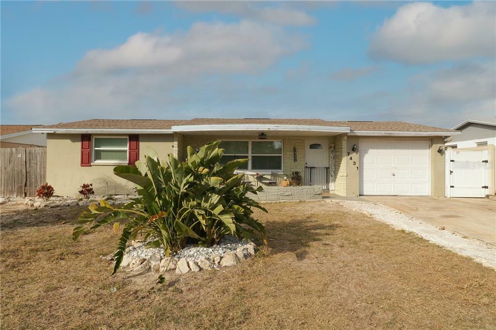 Property Photo:  7431 Abalone Drive  FL 34668 