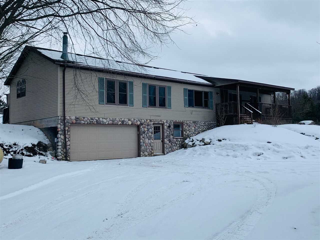 Property Photo:  802 W Dietz  MI 49712 