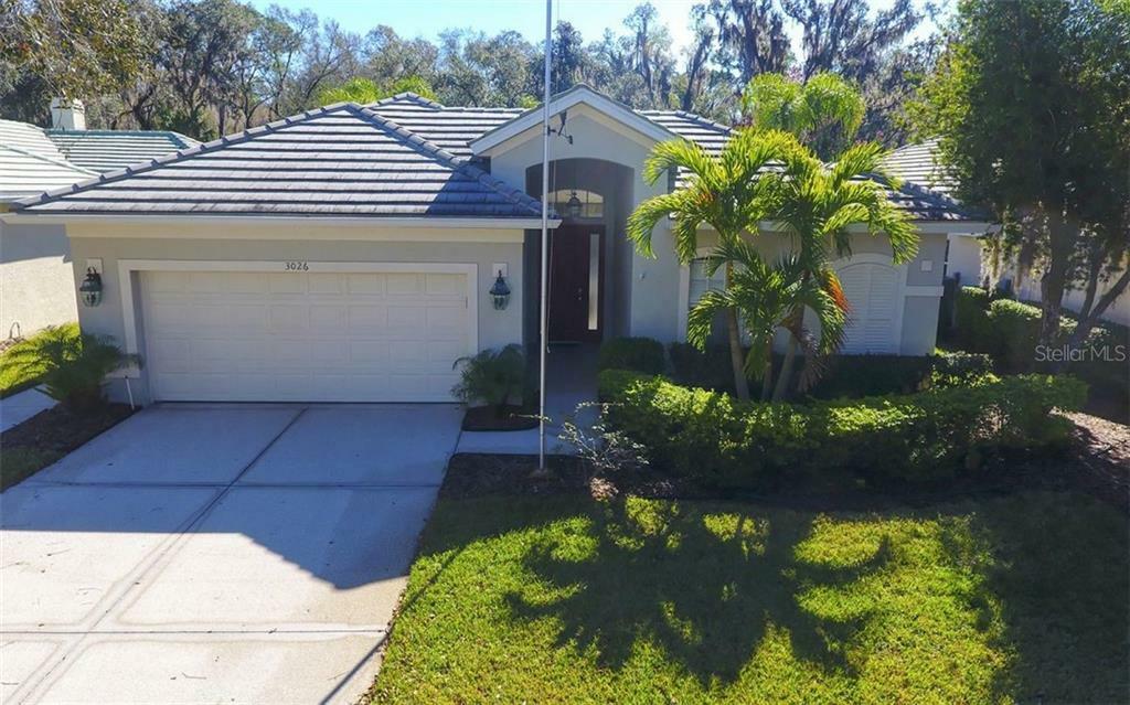 Property Photo:  3026 Woodland Fern Drive  FL 34219 