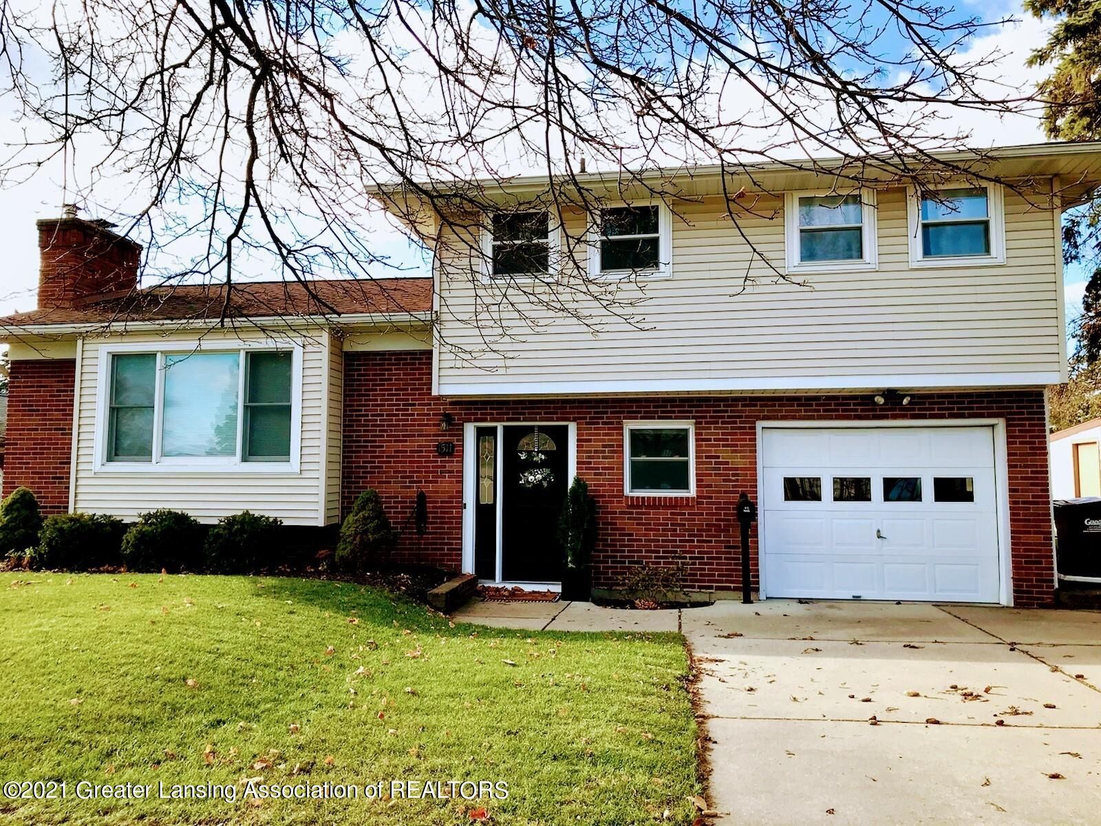 Property Photo:  1511 Briarwood Drive  MI 48917 