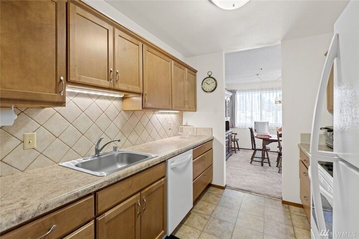 Property Photo:  18620 52nd Ave W 145  WA 98037 