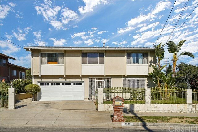 Property Photo:  12501 Terra Bella Street  CA 91331 