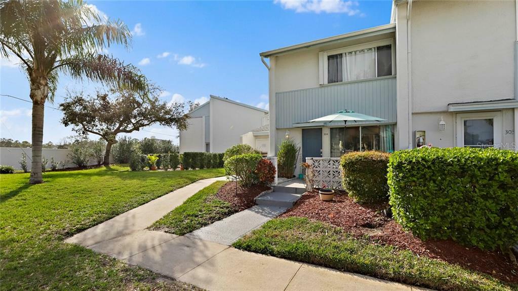 Property Photo:  14800 Walsingham Road 304  FL 33774 