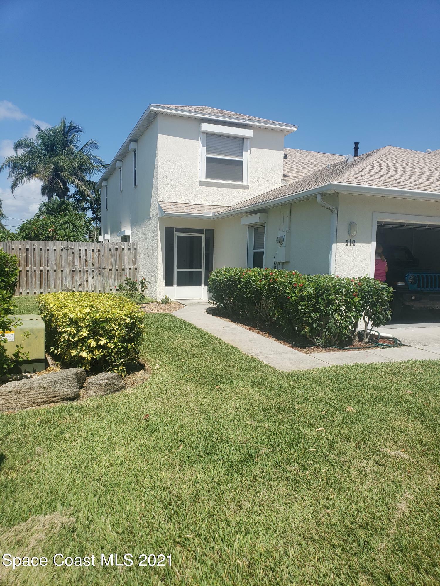 Property Photo: 212 Thatch Palm Court FL 32937