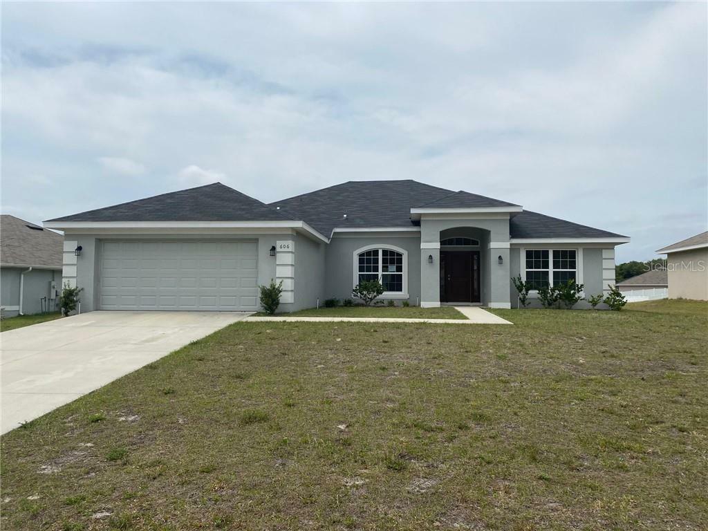 Property Photo:  606 Bradley Way  FL 34731 