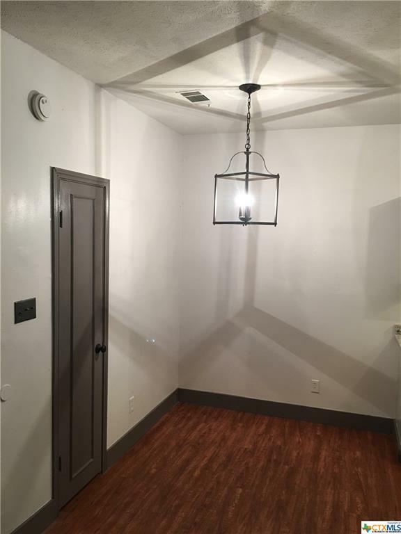 Property Photo: 421 W San Antonio Street 1-H TX 78666
