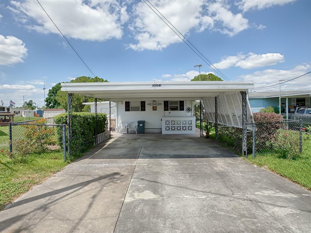 Property Photo:  30041 Wausaukee Drive  FL 32778 