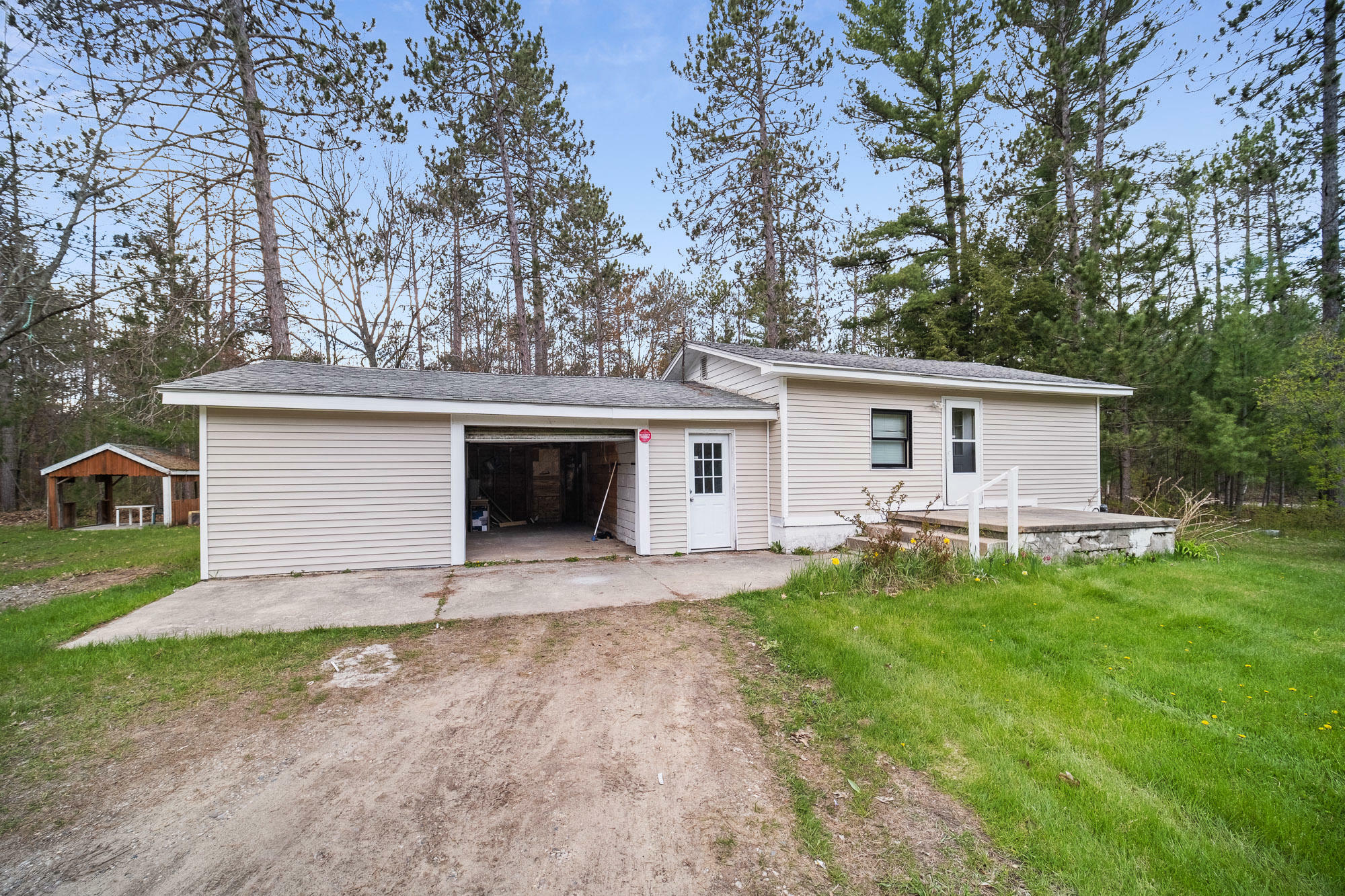 Property Photo: 1863 N M-33 MI 49721