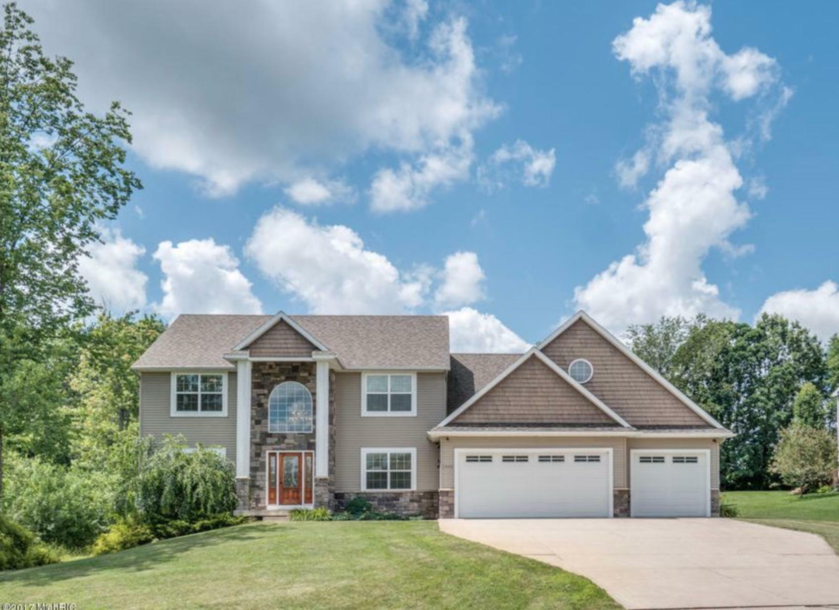 Property Photo:  8445 Curley Trails Drive SE  MI 49316 