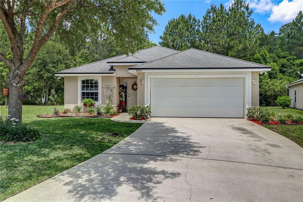 Property Photo:  86011 Windfern Court  FL 32097 