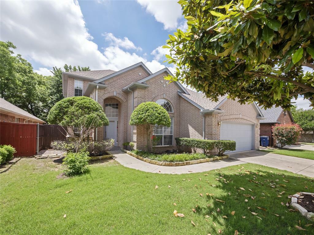 Property Photo: 1702 Tealwood Lane TX 76210