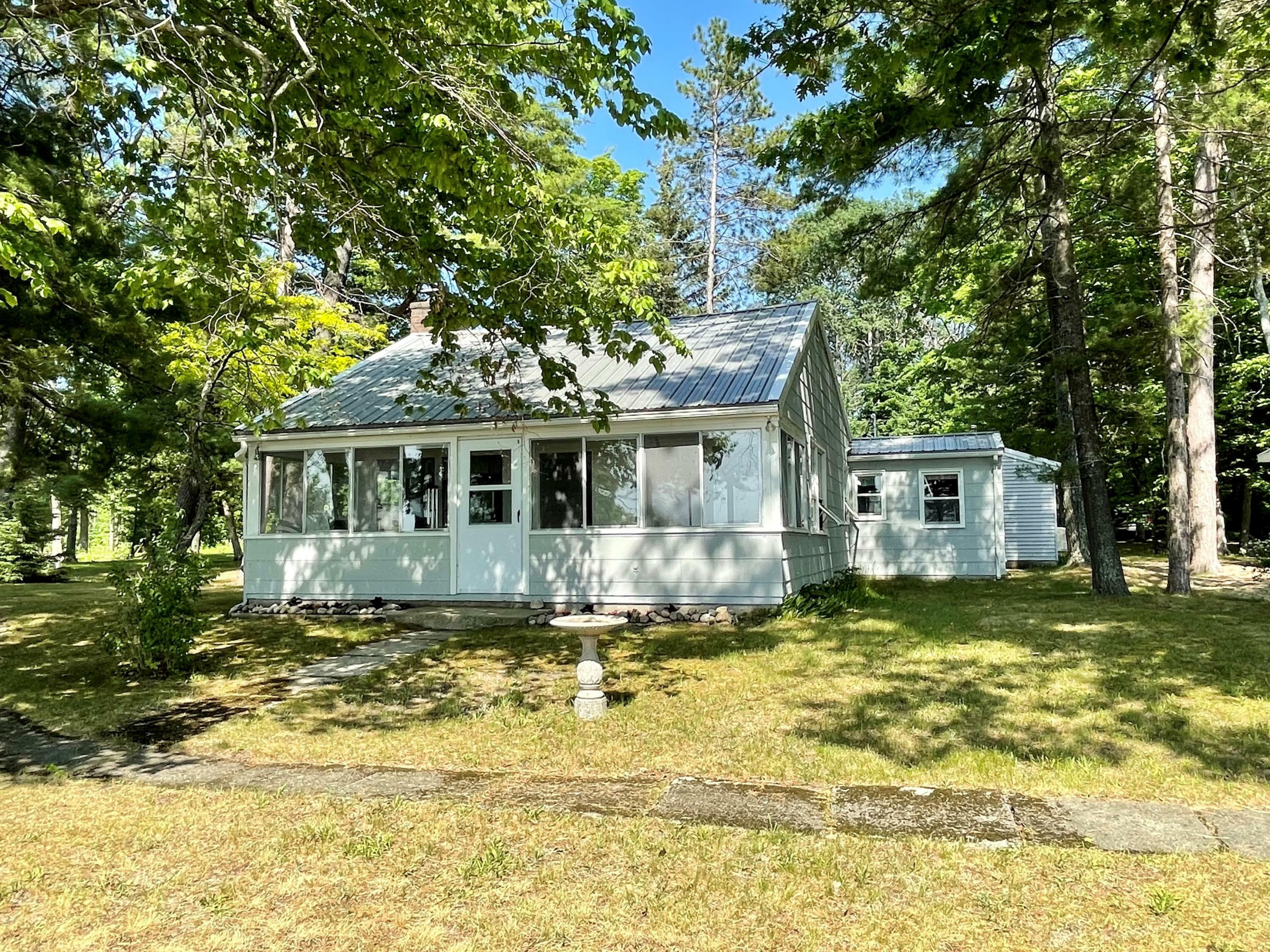 Property Photo:  6665 Orchard Beach Drive  MI 49721 