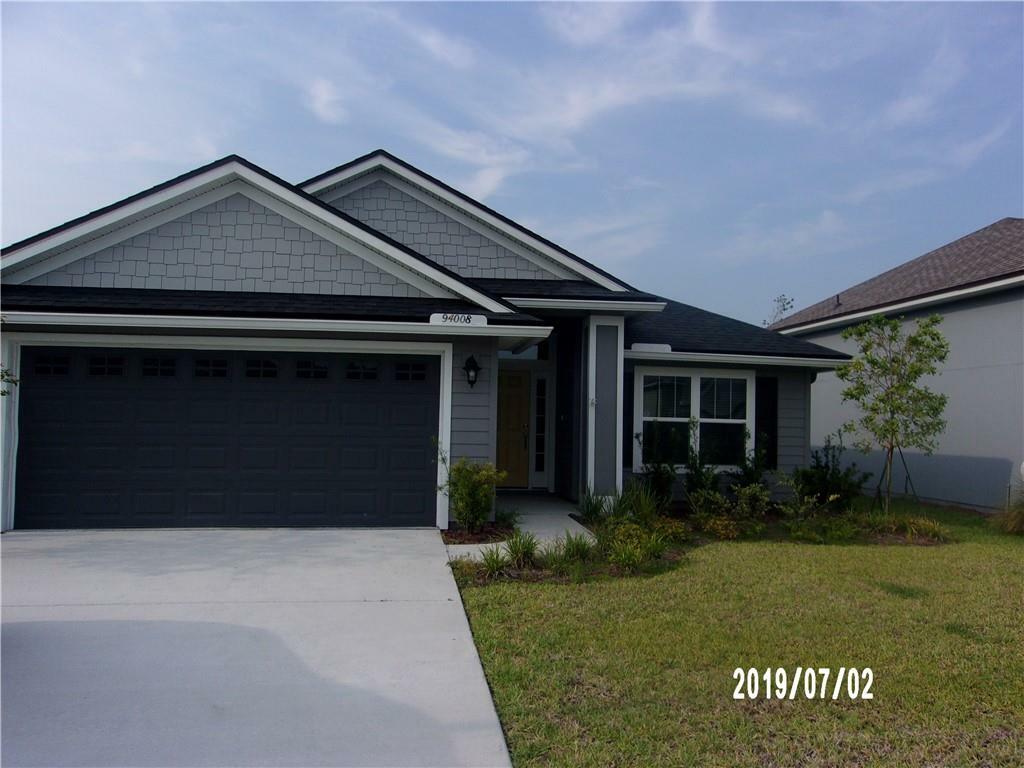 Property Photo:  94008 Woodbrier Circle  FL 32034 