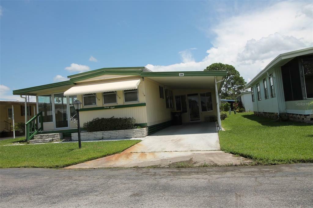 Property Photo:  1401 W Highway 50 28  FL 34711 