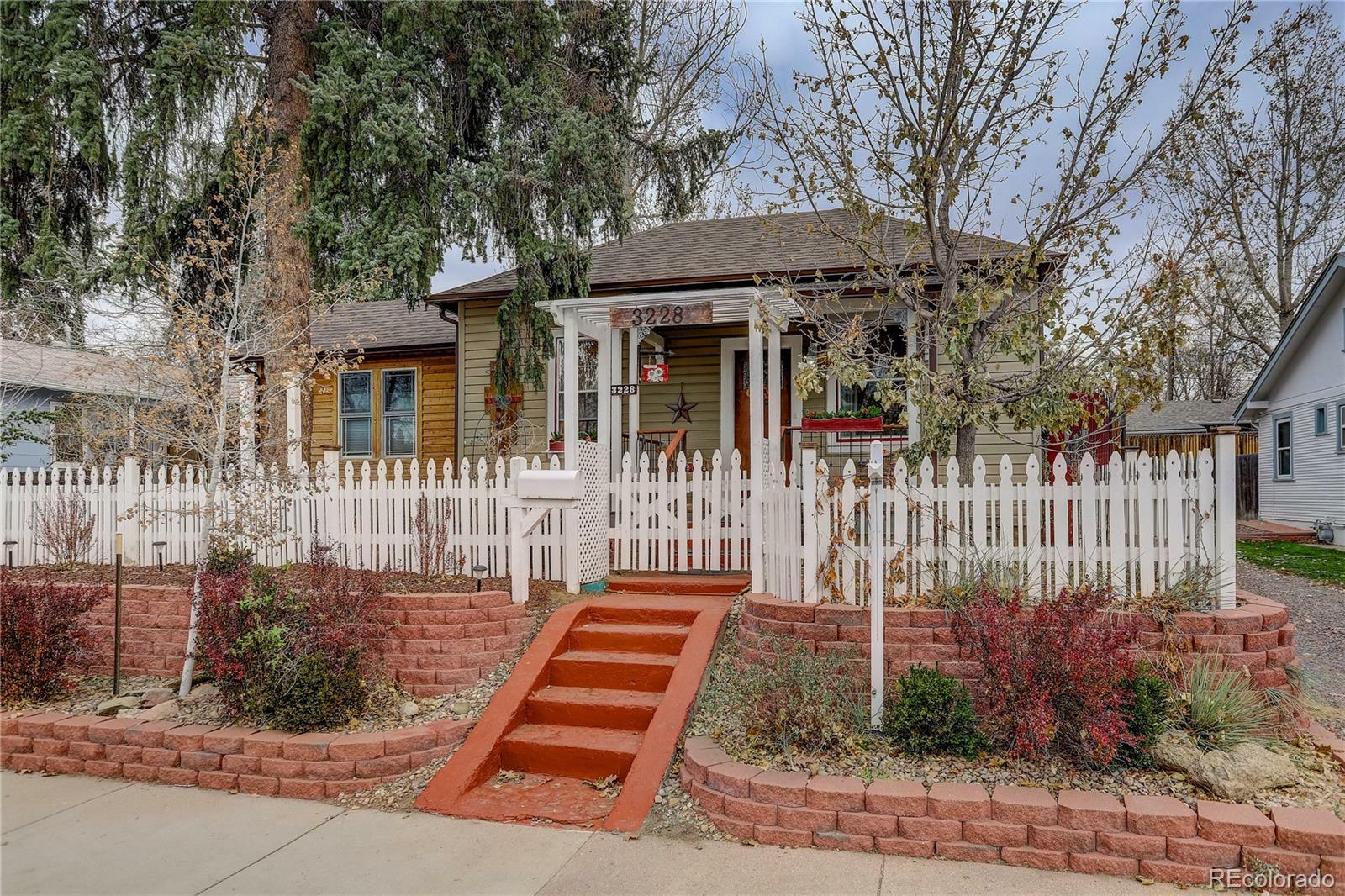 Property Photo:  3228 S Pearl Street  CO 80113 