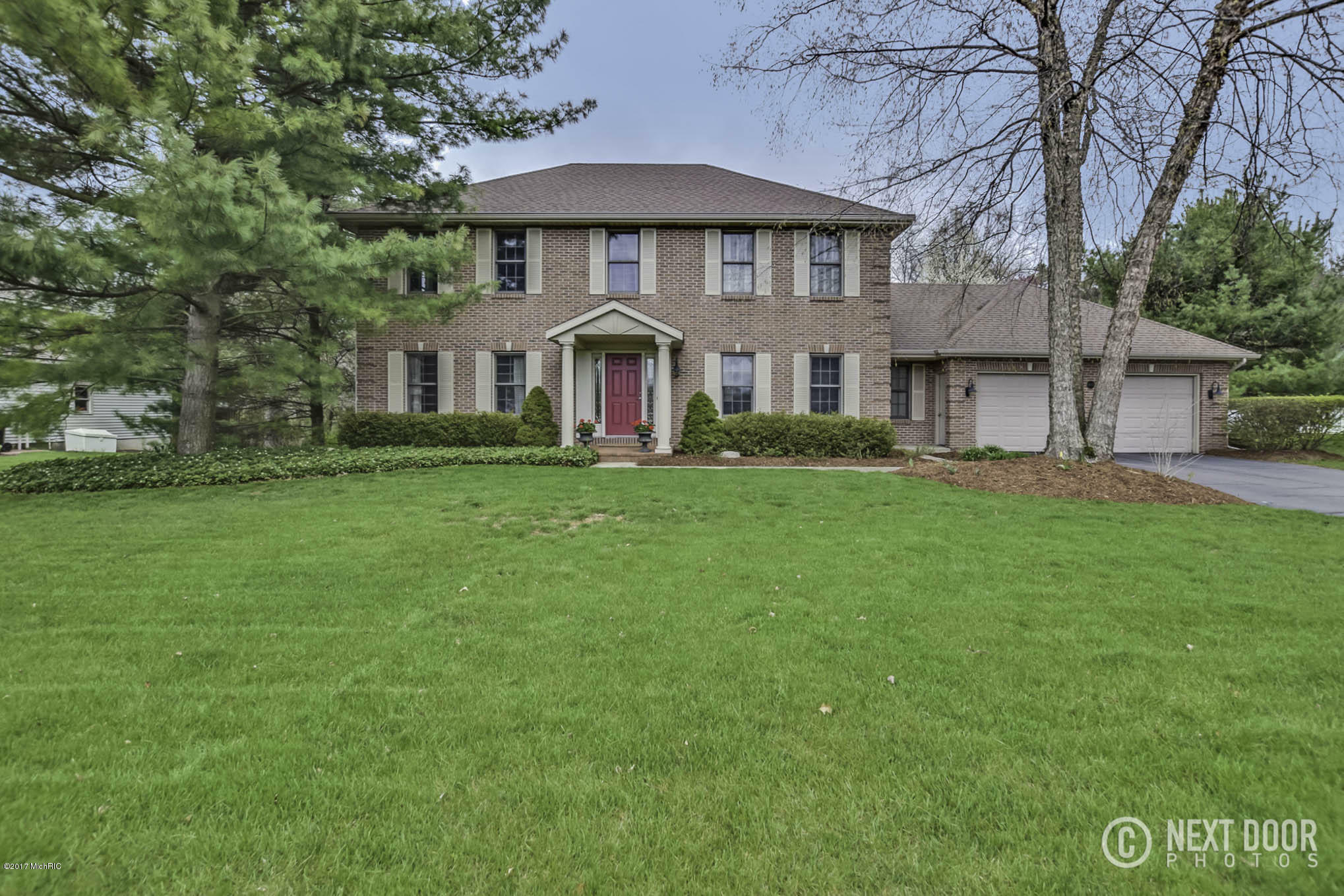 Property Photo:  1855 Erin Isle Drive  MI 49424 