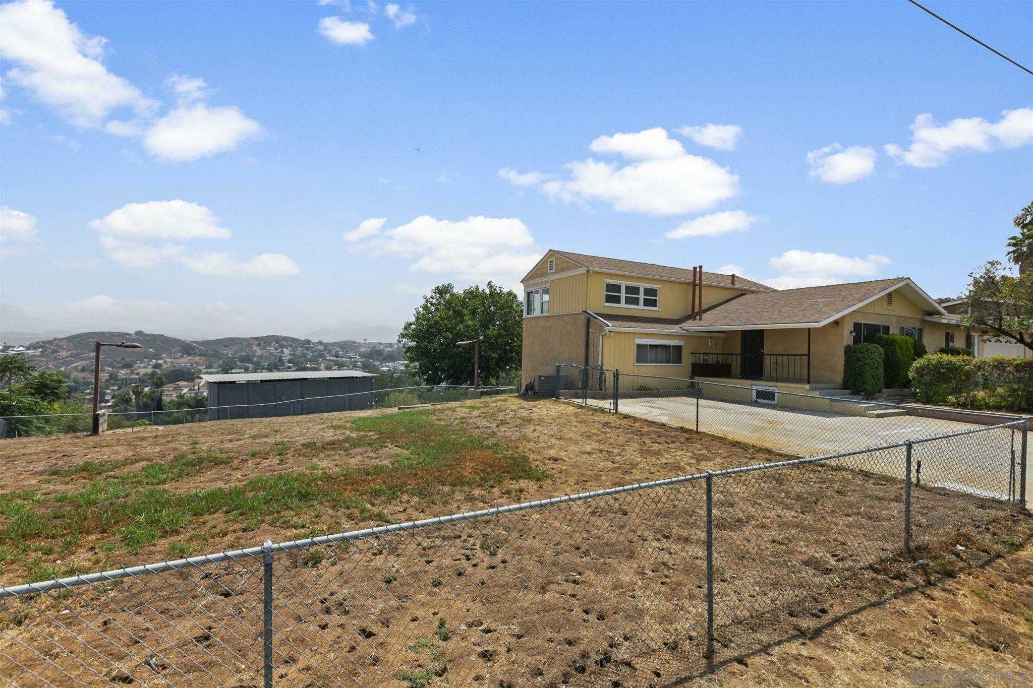 Property Photo:  8657 Almond Rd  CA 92040 