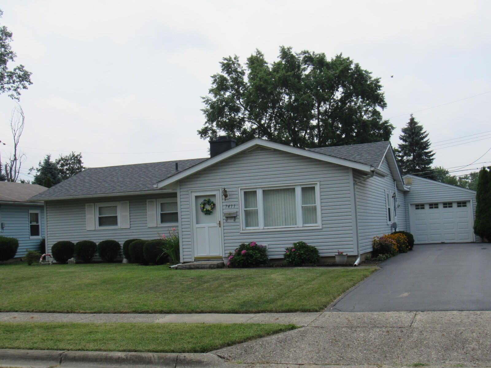 Property Photo:  7411 Wollam Avenue  OH 43068 