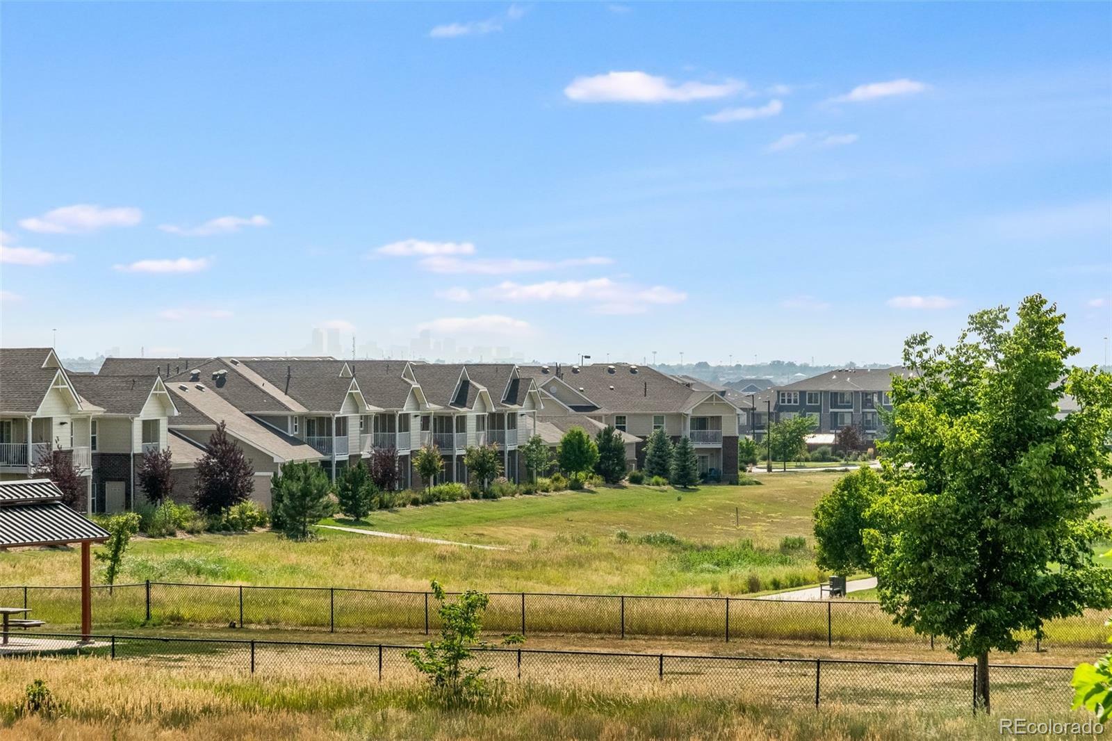 Property Photo: 5735 N Genoa Way 11-208 CO 80019