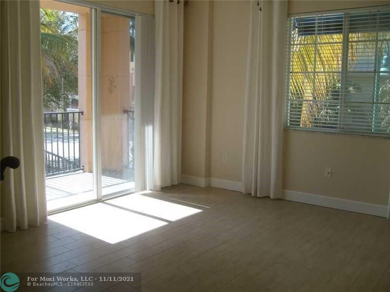 Property Photo:  255 NE 3rd Ave 2-218  FL 33444