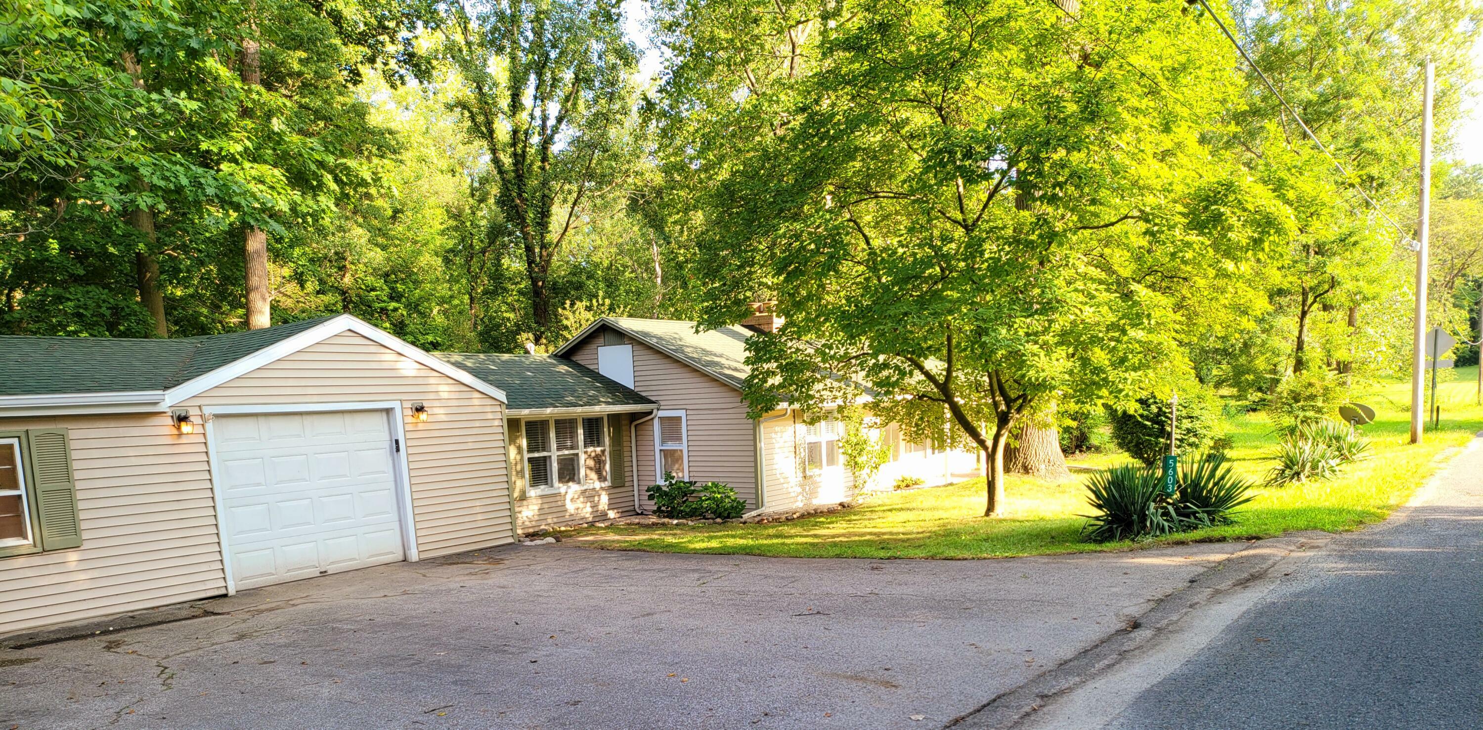 Property Photo:  5603 Interlochen Road  MI 49038 