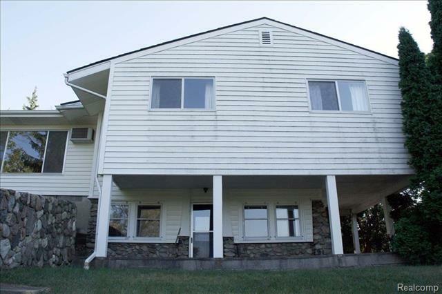 Property Photo:  1760 W Oakley Park Road  MI 48390 