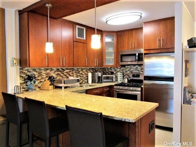 Property Photo:  18-15 215th Street 12 K  NY 11360 