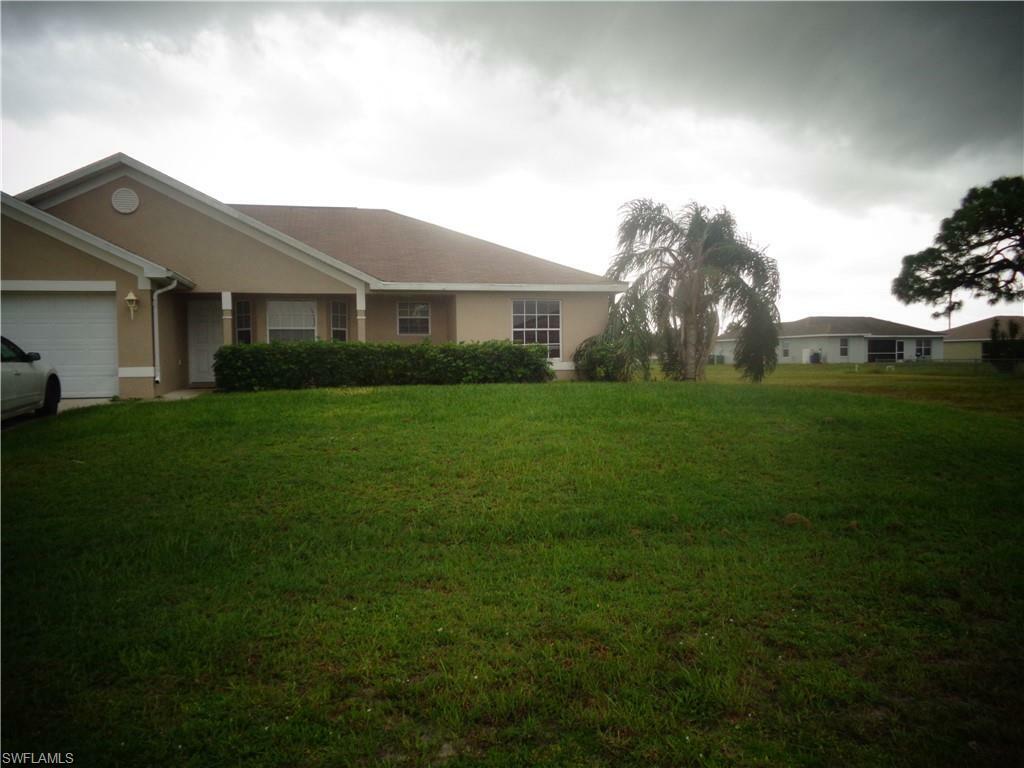 Property Photo:  100 NW 30th Street  FL 33993 