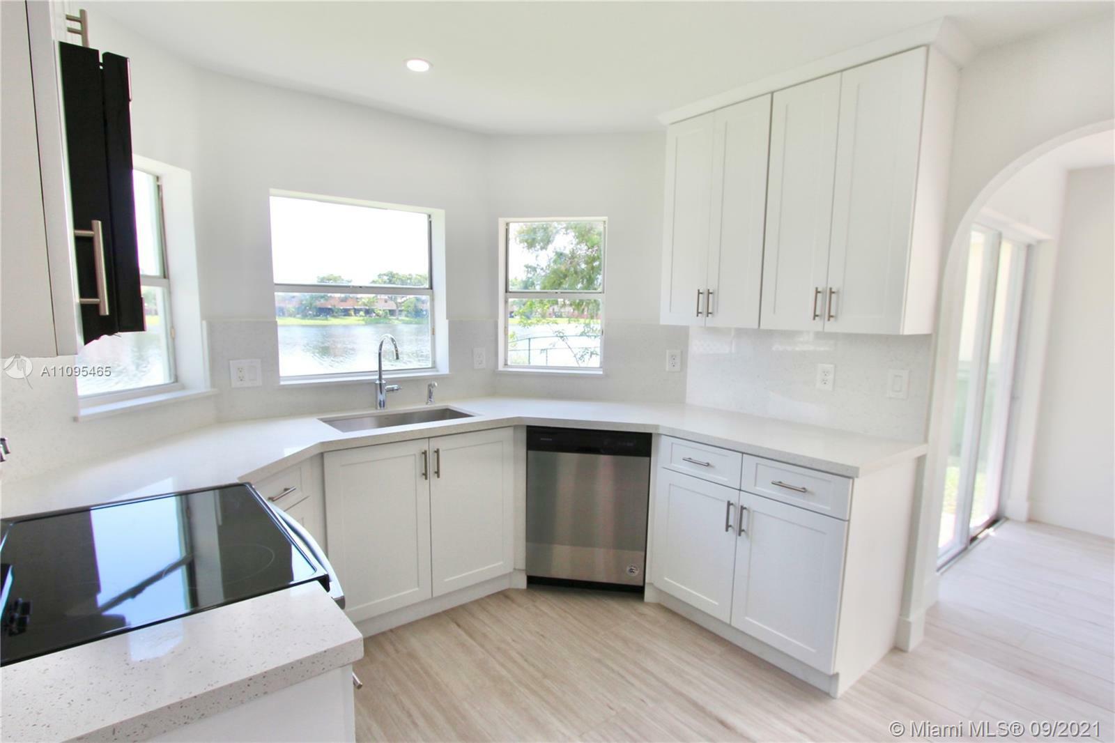 Property Photo:  239 NW 107th Ave  FL 33026 