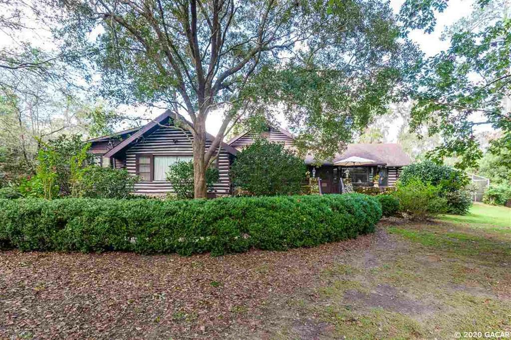 Property Photo:  1639 NW 11th Road  FL 32605 