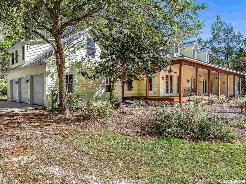 Property Photo:  2058 SW 56th Avenue  FL 32608 