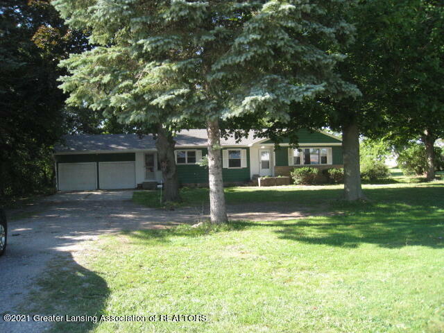 Property Photo:  4963 W Grand River Avenue  MI 48906 