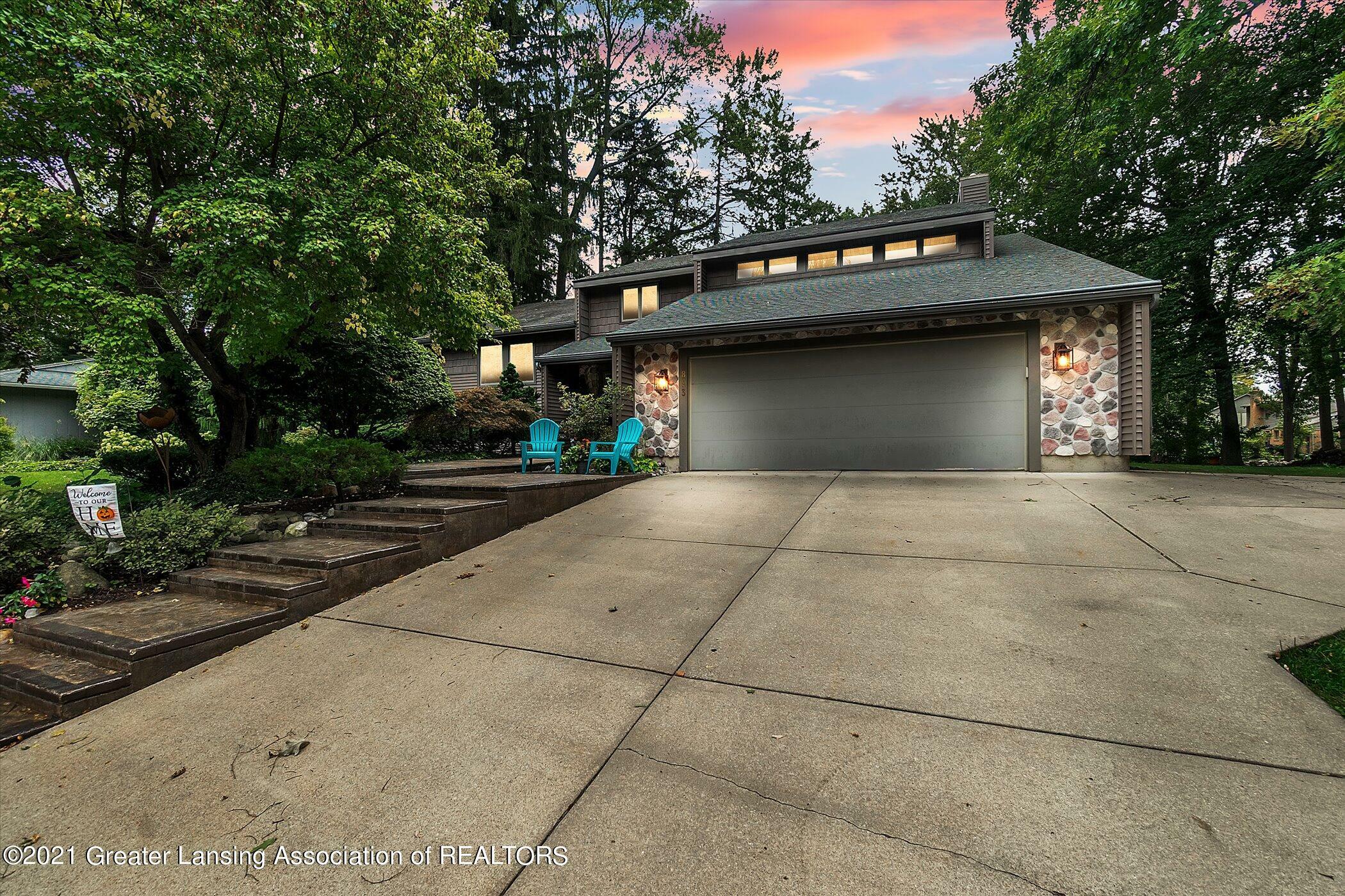 Property Photo:  893 Whitman Drive  MI 48823 