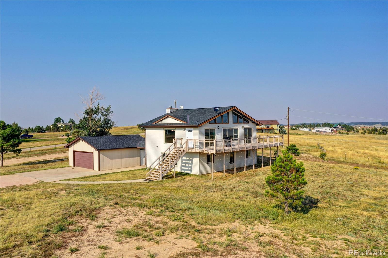 Property Photo: 13055 Woodlake Road CO 80106
