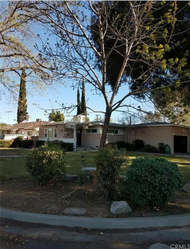 Property Photo:  8164 Camelia Drive  CA 92504 