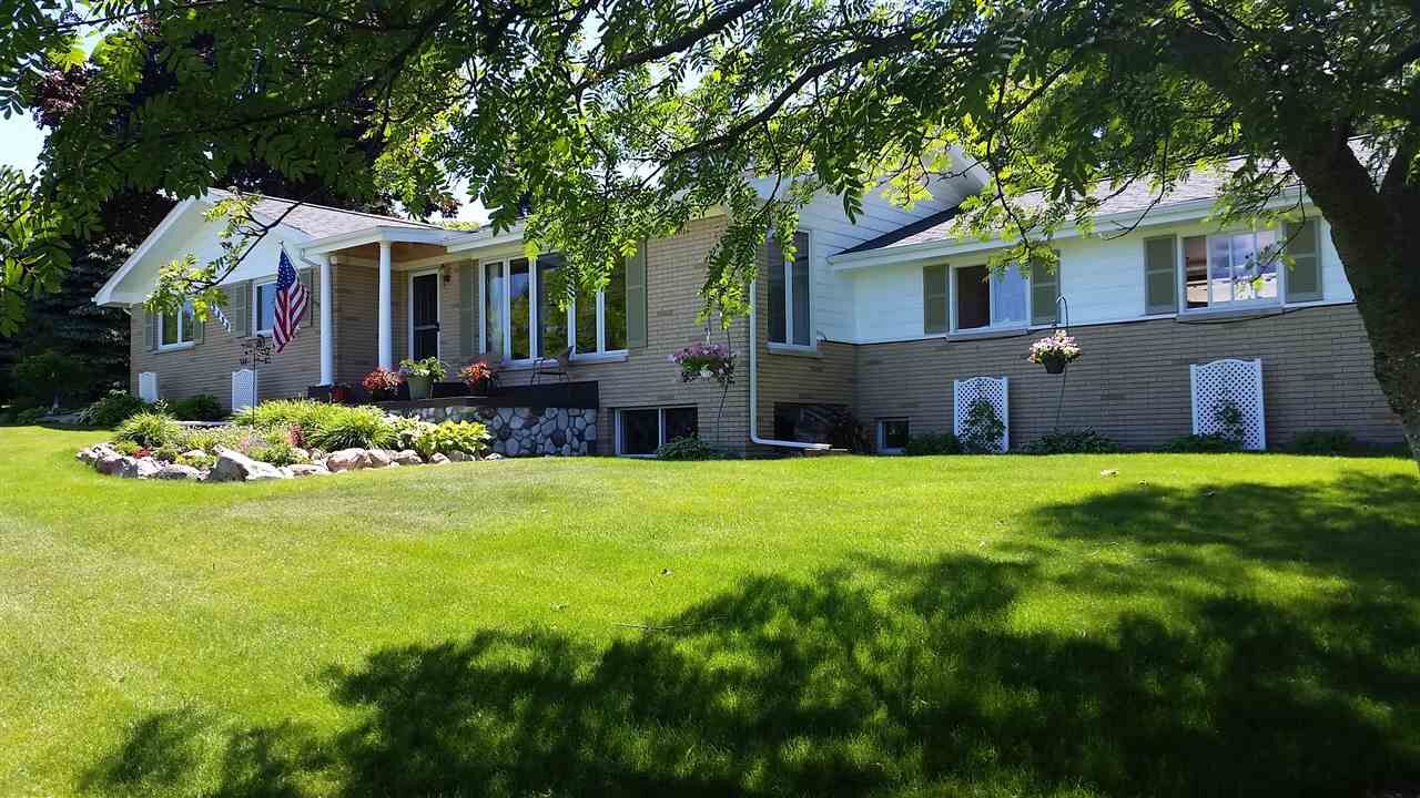 Property Photo:  18080 Hilltop Drive  MI 49720 