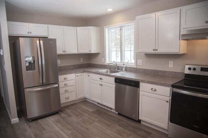 Property Photo: 4 Mill Pond Road NH 03850
