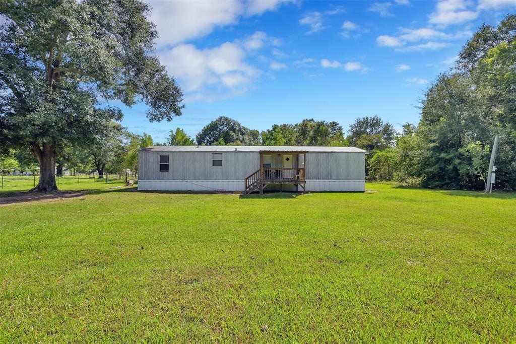 Property Photo:  26972 State Street  TX 77328 