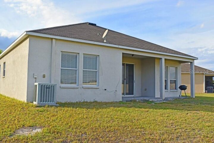 Property Photo: 24710 Volterra Court FL 33559