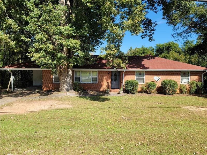 Property Photo:  909 E McIntosh Road  GA 30223 