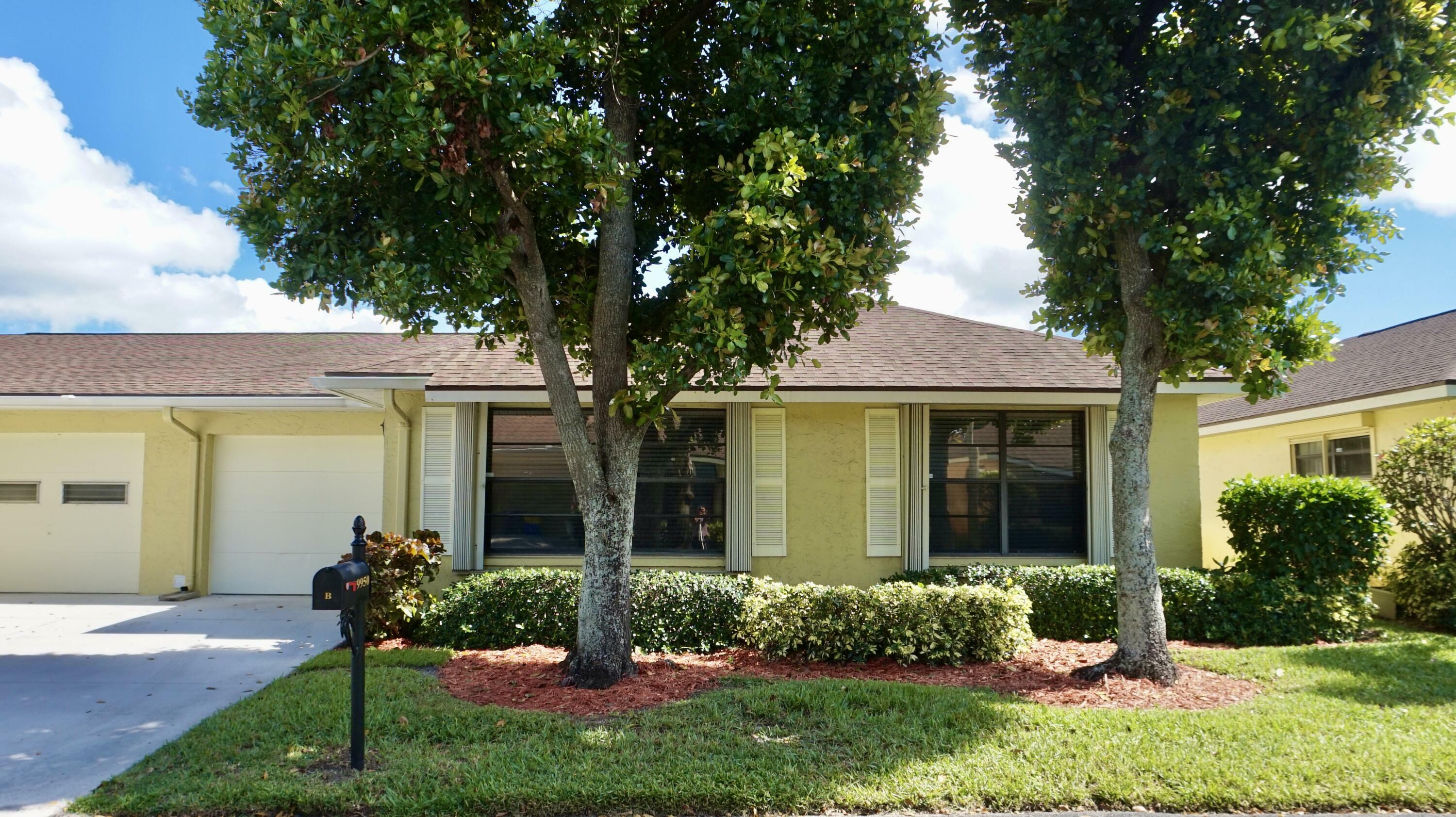 Property Photo:  9950 Orchid Tree Trail B  FL 33436 