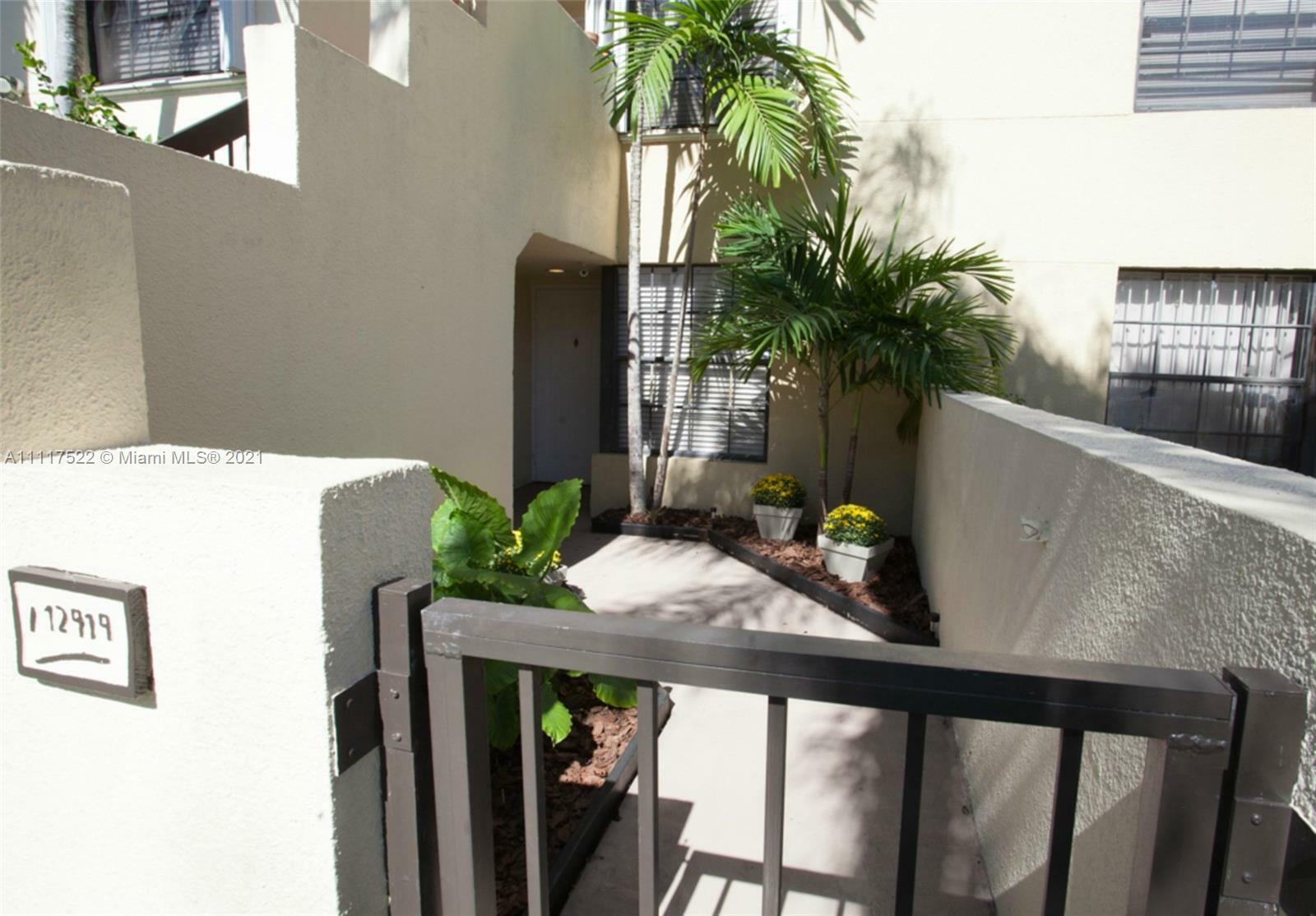 Property Photo:  12919 SW 88th Ter C-103  FL 33186 