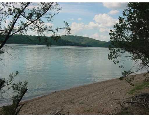 Property Photo:  Point Mirage (D) Road  AR 72631 