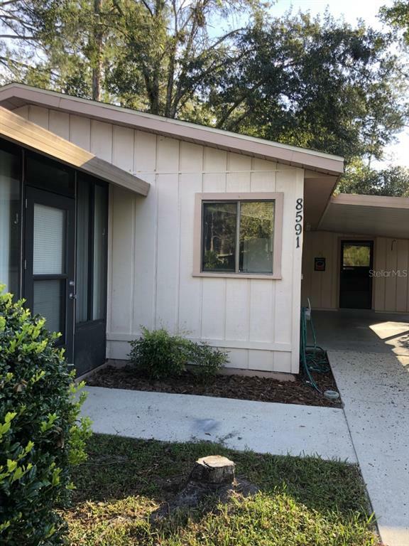 Property Photo:  8591 NW 42 Street 392  FL 32653 