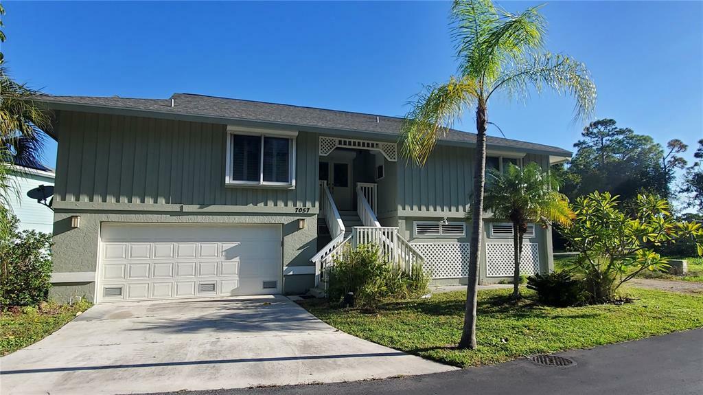 Property Photo:  7057 Pinebay Boulevard  FL 34224 