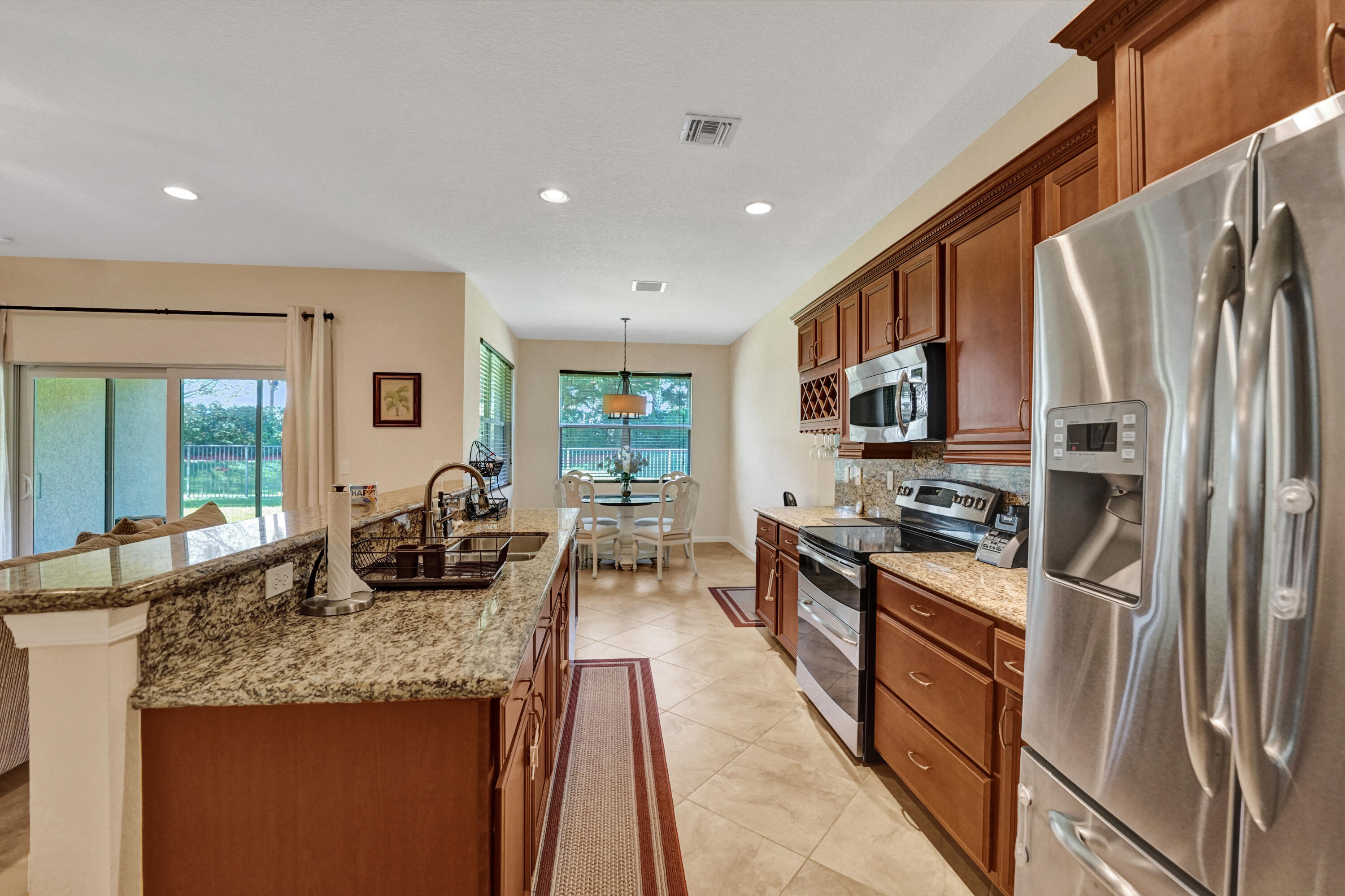 Property Photo: 9509 Cobblestone Creek Drive FL 33472