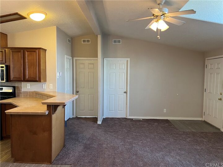 Property Photo:  16860 Slover Avenue 75  CA 92337 
