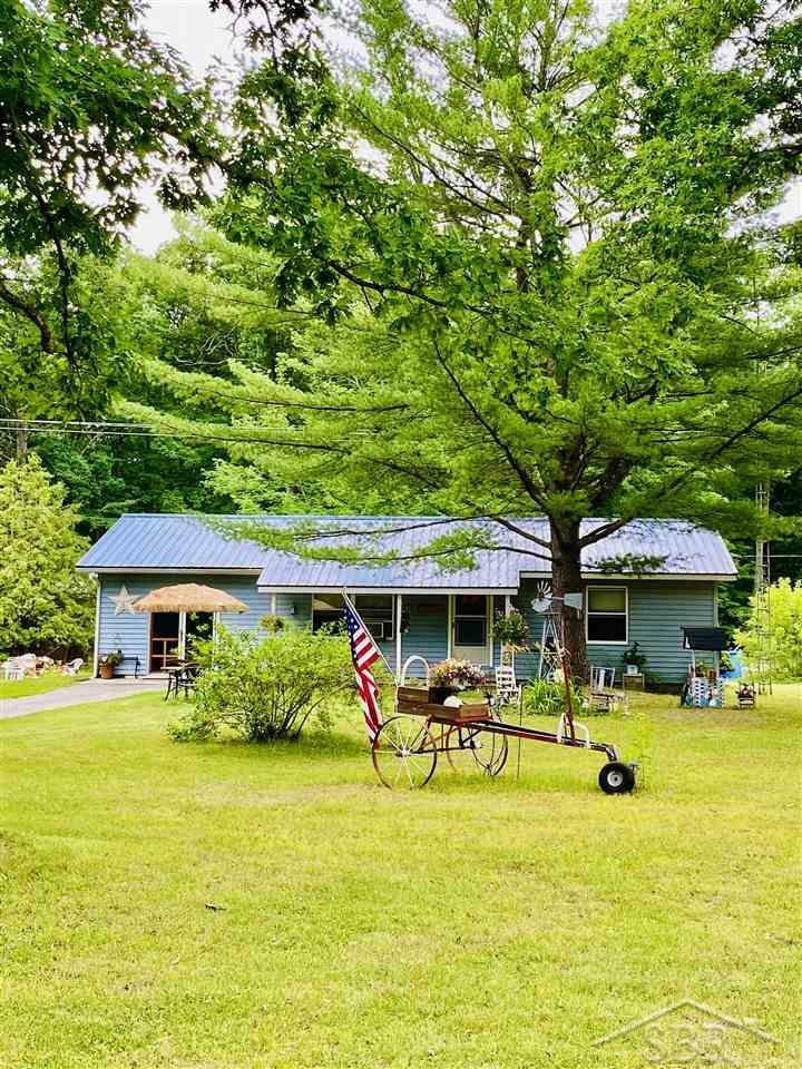 Property Photo:  6514 E. Townline Lake Rd  MI 48625 